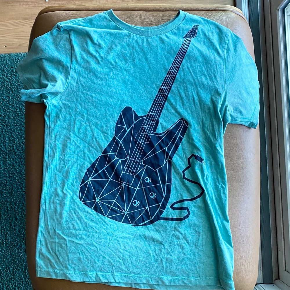 Aqua blue kids guitar tshirt. Size 10-12